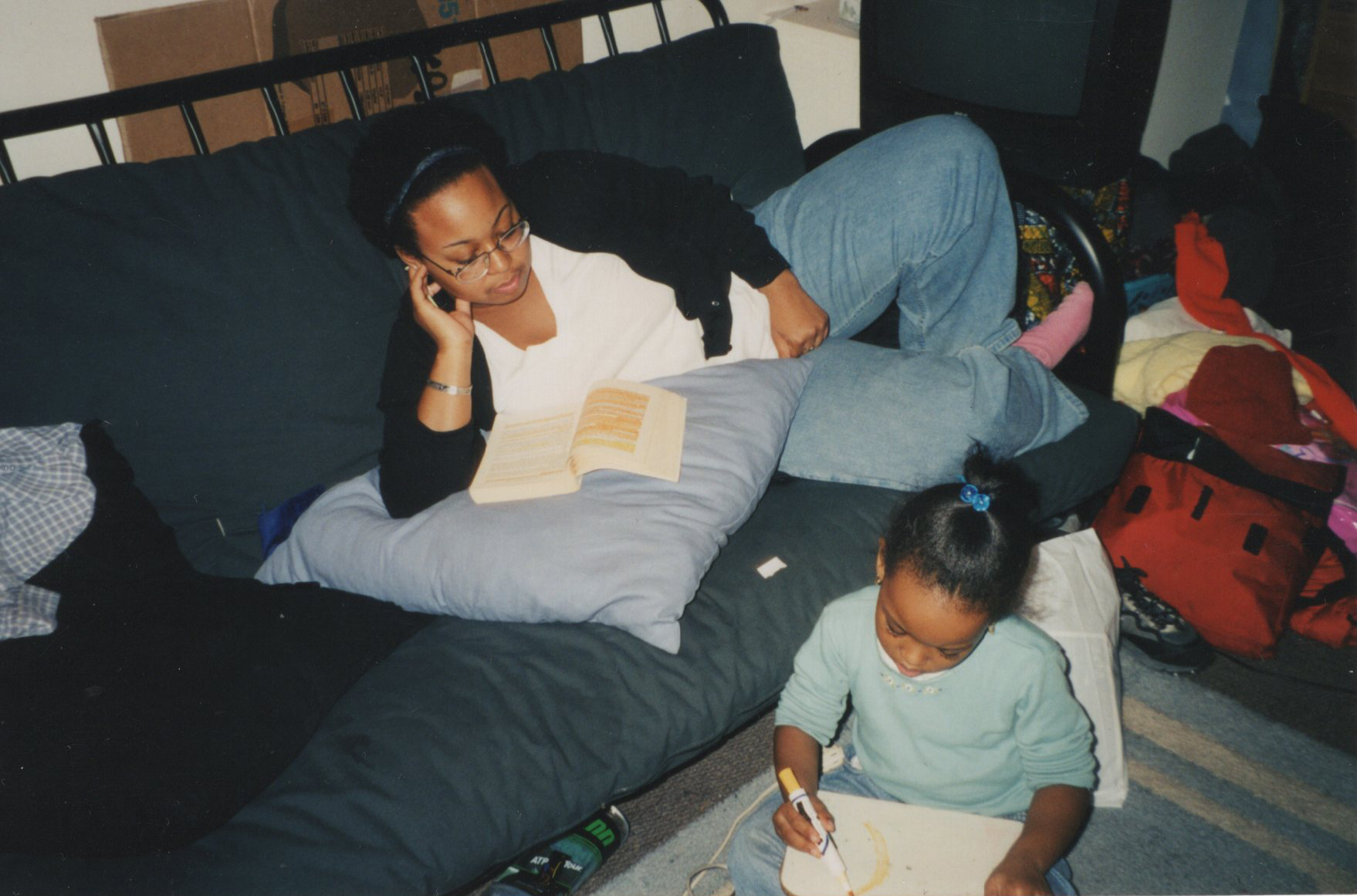 Christa studying with her daughter, Nikierra.
