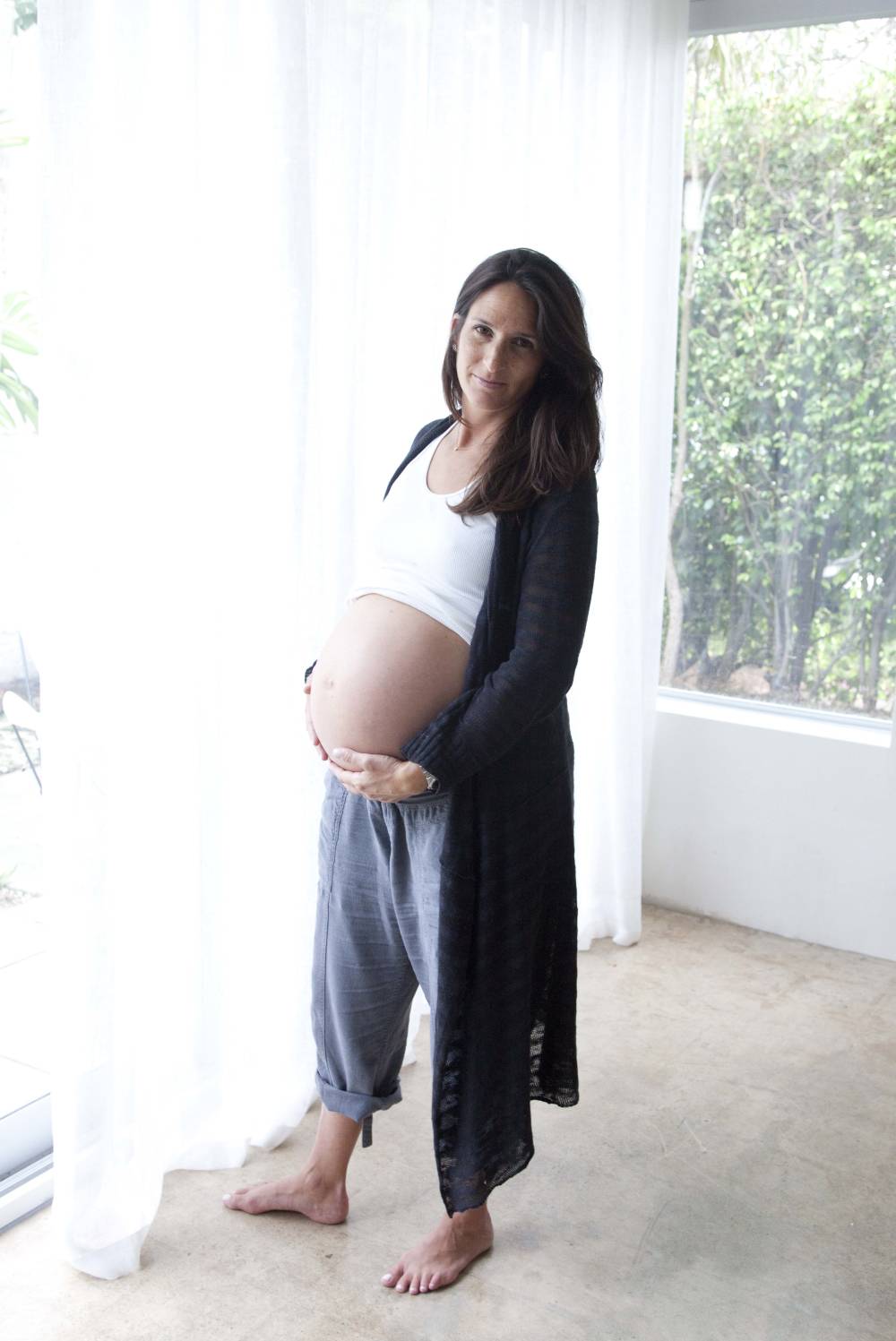 A beautifully pregnant Rhonda Mitrani.